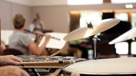 undefineda mixed course playing drums, clarinet and other mixed instruments